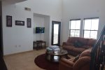 el dorado ranch rental villa 433 - down stairs living room with tv and patio door 